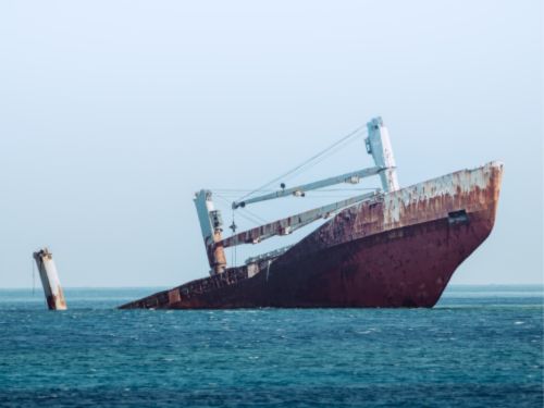 Ship sinking at sea